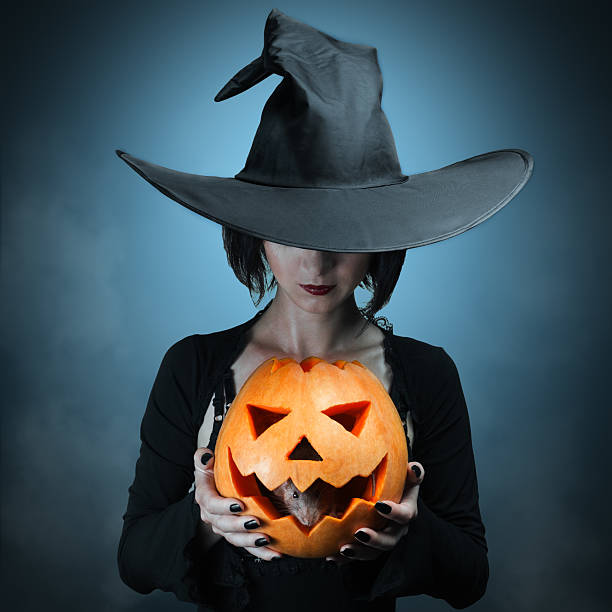 Halloween pumpkin and gray mouse