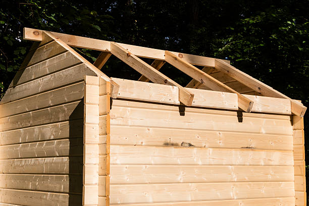 istock Construction of a wooden hut 462314329