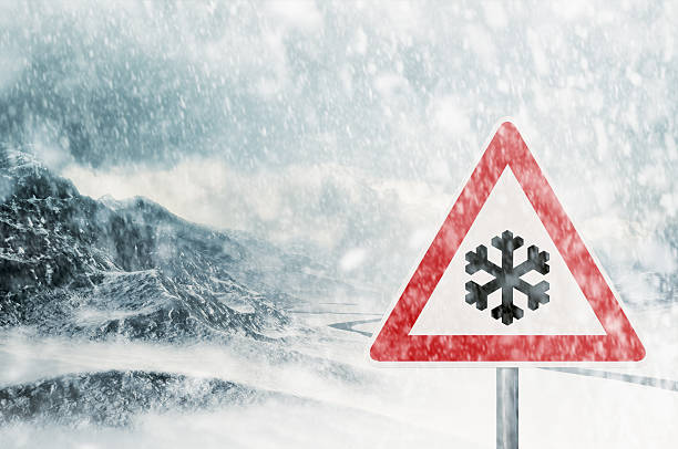istock winter driving - snowfall in the mountains 462316233