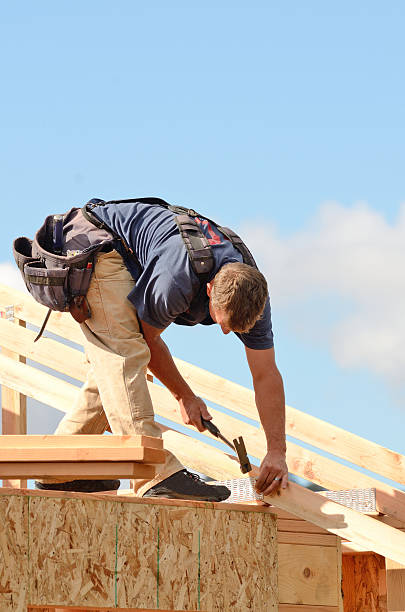 istock A roof rafter placing wooden planks 462317783