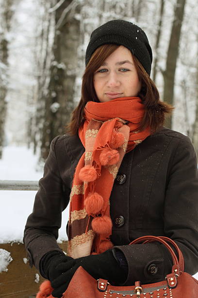 istock woman in winter Park 462317797