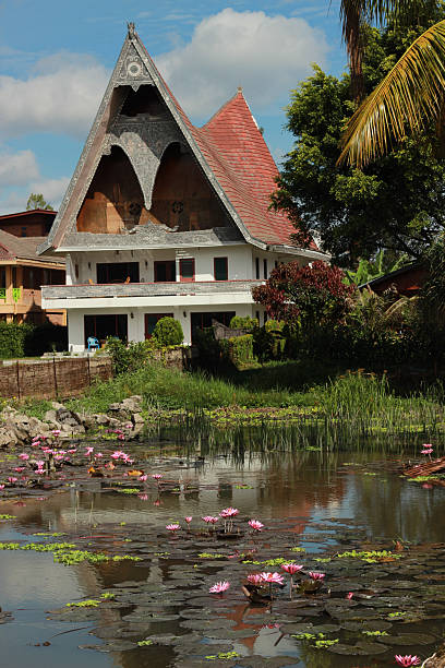 istock Batak style building by the lily pond 462320501