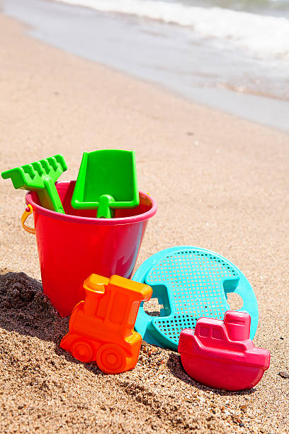 istock plastic toys on the beach 462326369