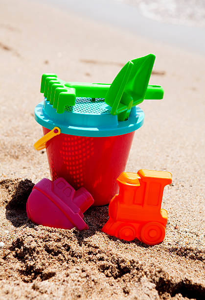 istock plastic toys on the beach 462327481