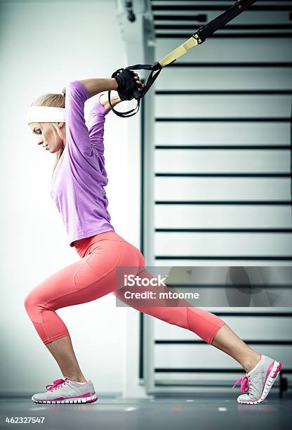 Functional Training Stock Photo - Download Image Now - Suspension Training, Exercising, One Woman Only