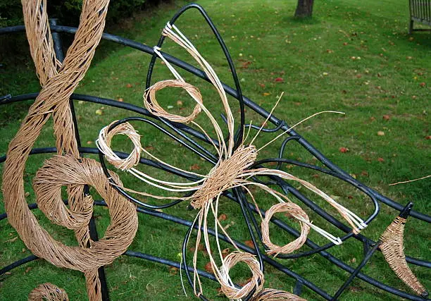 This parkland sculpture of musical note and butterfly are made from twisted willow.