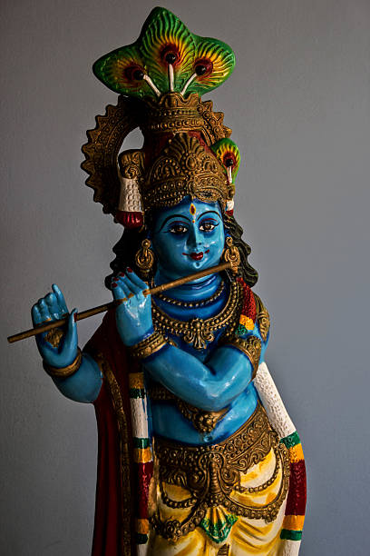 istock statue of lord Krishna 462330613