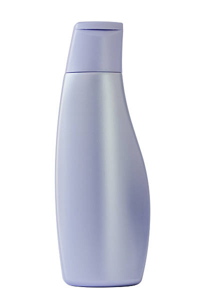 plastikowe butelki szamponu na białym tle - liquid soap purple isolated cosmetics zdjęcia i obrazy z banku zdjęć