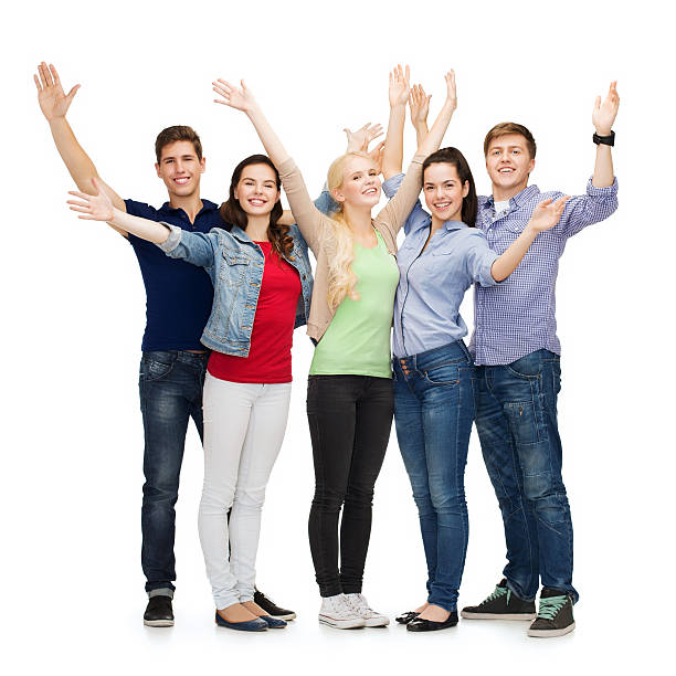 istock group of smiling students waving hands 462334665