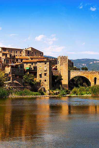 istock Medieval town on the banks of  river 462336531