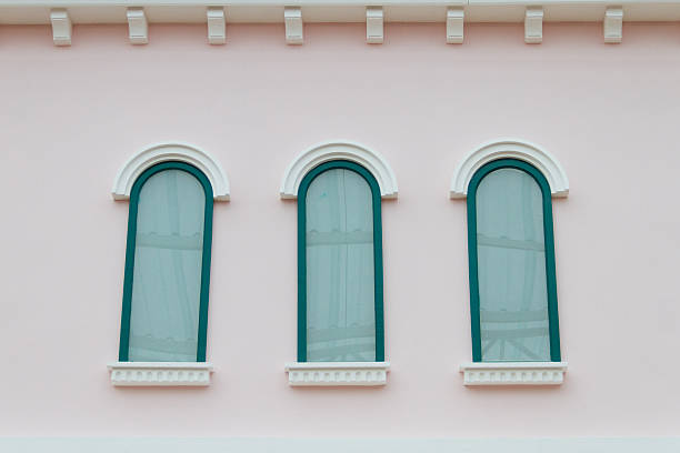 istock green windows on the pink walls 462341145