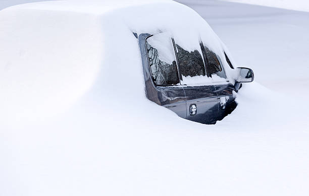 istock Car under snow in winter 462341691