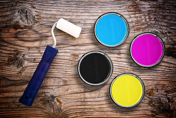 istock CMYK colors in tin cans 462344643