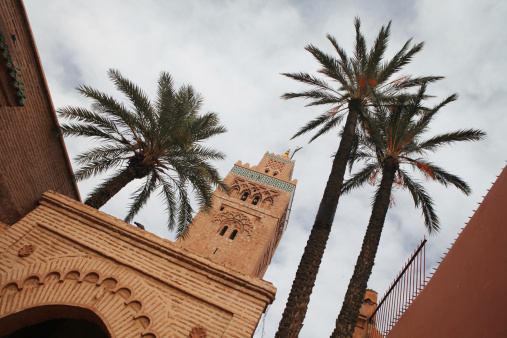Minaret and Palm Trees on Koutoubia Mosque in Marrakech, Morocco, Africa.