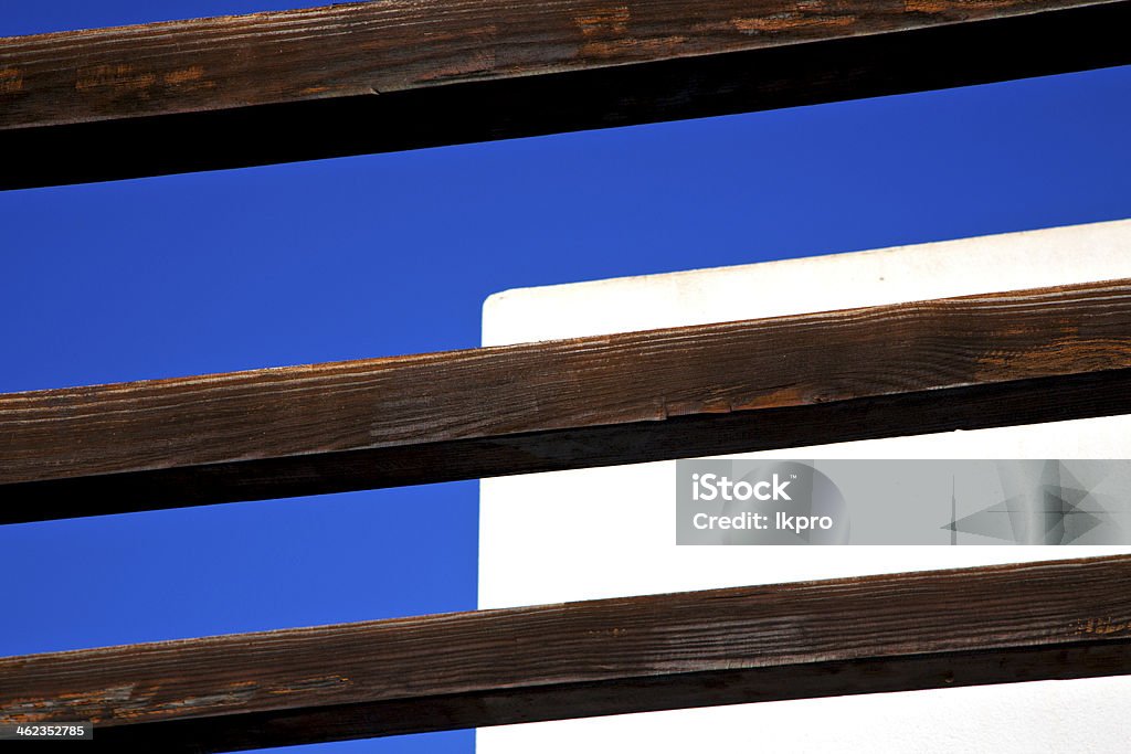 piece of brown   wood as a roof in piece of brown   wood as a roof in the sky  lanzarote spain Abstract Stock Photo