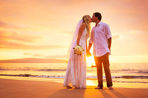 istock Bride and Groom, Enjoying Amazing Sunset 462354231