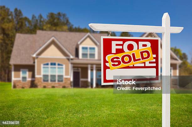 Sold Home For Sale Sign In Front Of New House Stock Photo - Download Image Now - Sold - Single Word, House, Sign