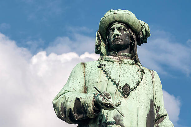 istock Bronze statue of jan van eyck the painter. 462358271