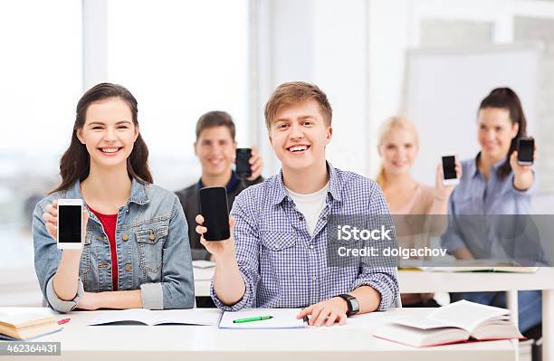 Students Showing Black Blank Smartphone Screens Stock Photo - Download Image Now - Animal, Black Color, Blank