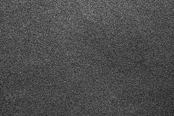 Fine-grained texture of a black abrasive material Fine-grained texture of a black abrasive material for wallpaper and for abstract backgrounds sand paper stock pictures, royalty-free photos & images