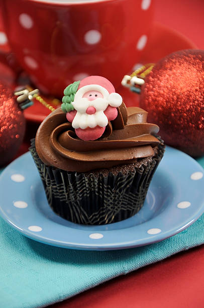 istock Christmas chocolate cupcakes with Santa faces 462374435