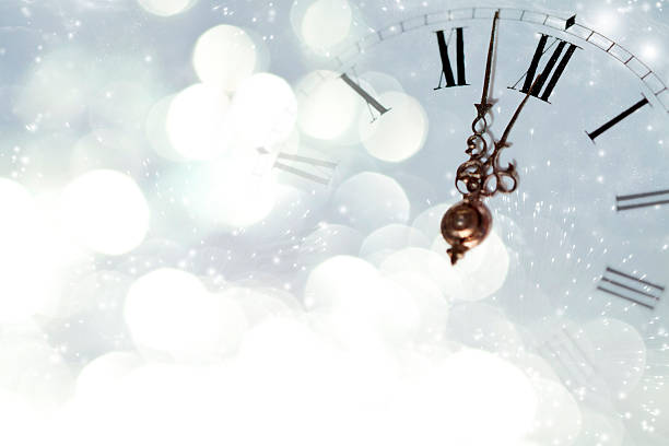 istock Vintage clock against holiday lights 462375333