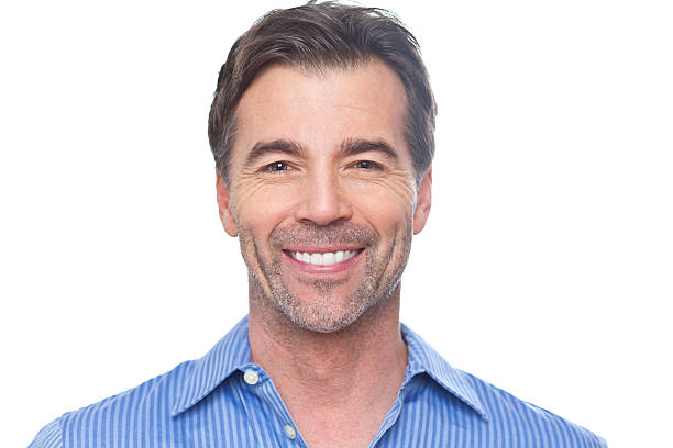 Portrait Of A Mature Man Smiling At The Camera stock photo