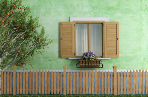 Detail of an old house with wooden fence and apple tree - rendering