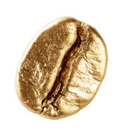 Gold coffee bean isolated on white background