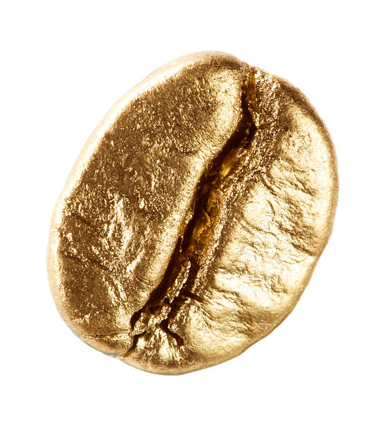 Gold coffee bean stock photo