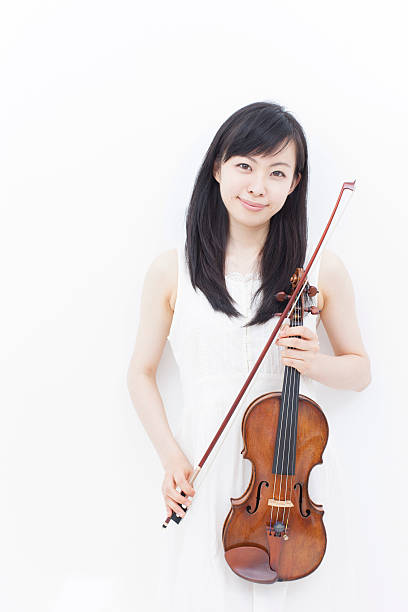 istock girl with violin 462386531