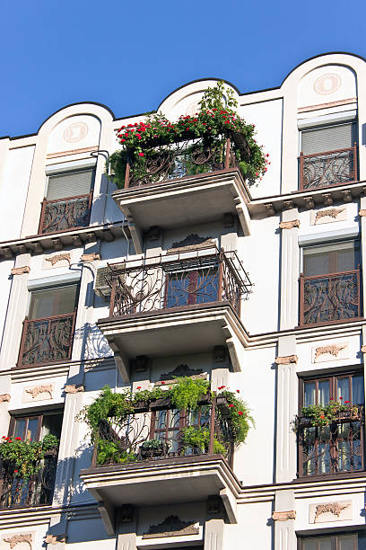 istock Old building with house plants on the balcony 462388133