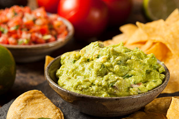 istock Green Homemade Guacamole with Tortilla Chips 462388703
