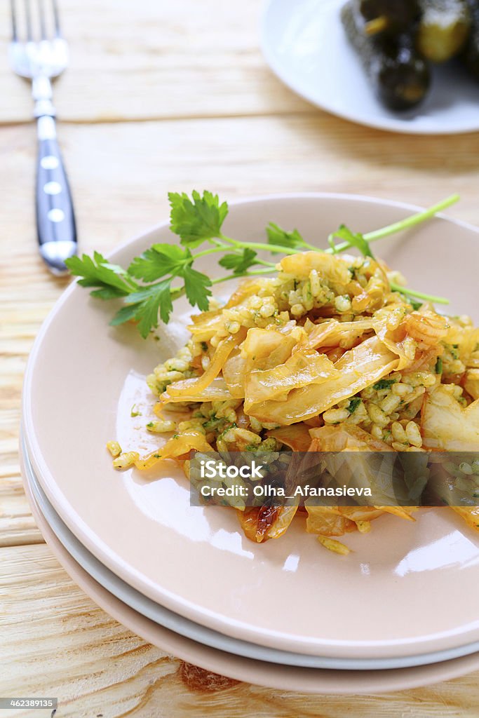 risotto with slices of braised cabbage risotto with slices of braised cabbage, food closeup Cabbage Stock Photo