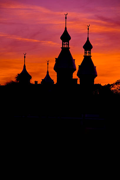 University of Tampa Sunset The minarets of the University of Tampa stand out in silhouette against the Florida sunset. minaret stock pictures, royalty-free photos & images