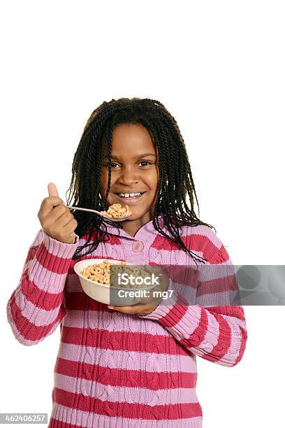 Little Black Girl Enjoying Bowl Of Cereal Stock Photo - Download Image Now - Breakfast Cereal, Child, Eating
