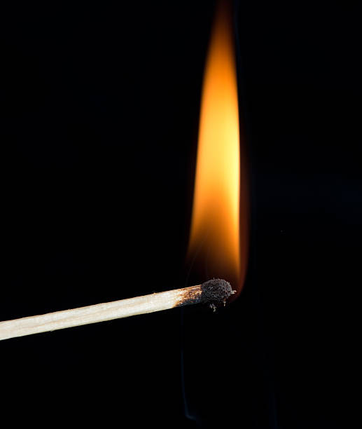 istock Ignition of a match, with smoke on dark background 462406813