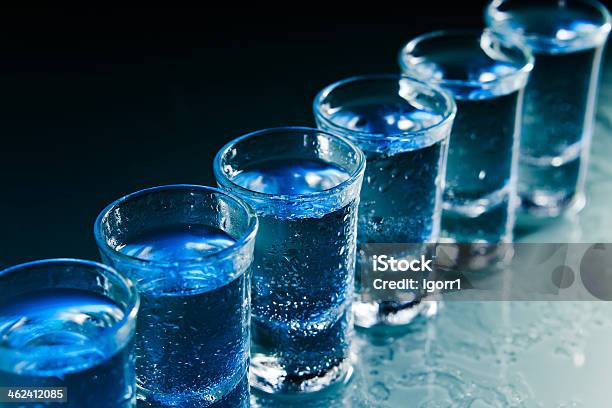 Glasses With An Alcoholic Drink Stock Photo - Download Image Now - Alcohol - Drink, Bar - Drink Establishment, Black Color