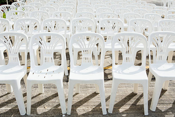 istock White plastic chairs in celebration and outdoor event 462429273