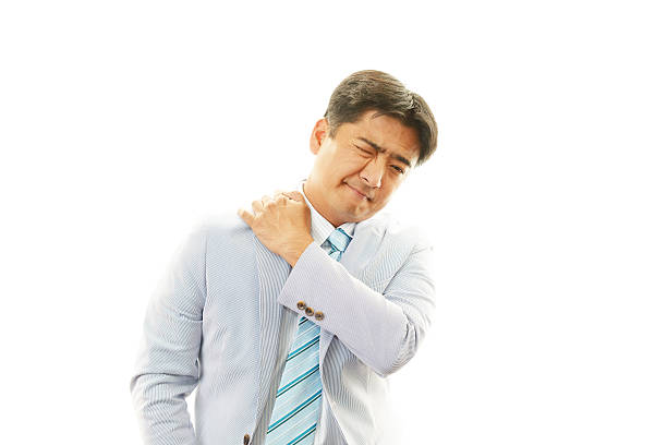 istock Businessman with shoulder pain. 462429559