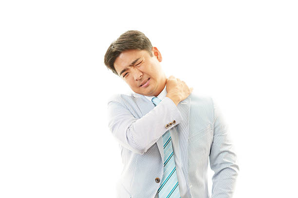 istock Businessman with shoulder pain. 462429567