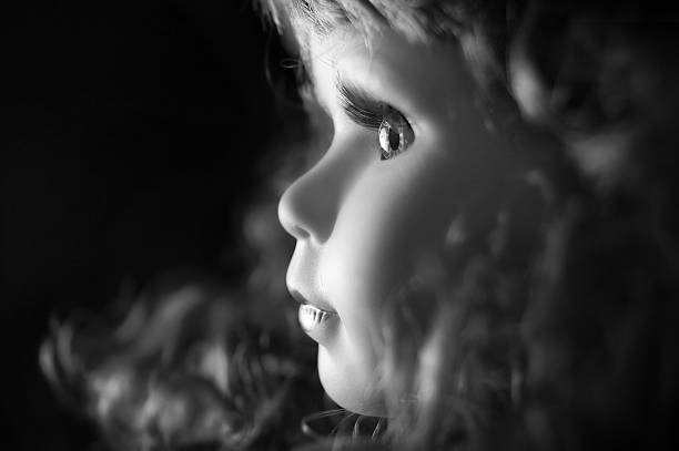 istock Vintage Porcelain doll, side view 462430865