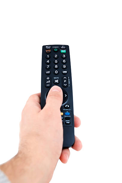 istock Hand holding television remote Isolated over white background . 462430939