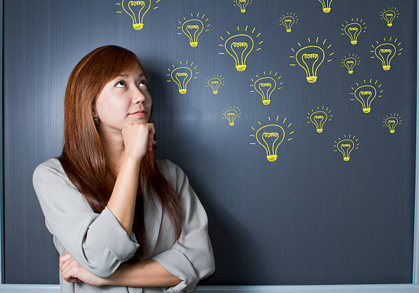 istock Beautiful thoughtful woman looking up. 462431665