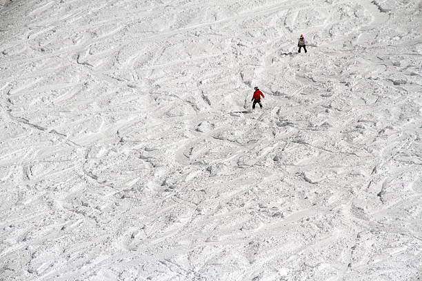 istock snowboarders on the mountain slope 462431823