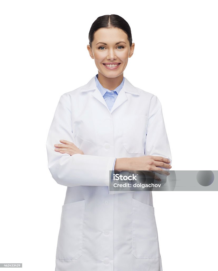 Young happy female doctor with her arms crossed healthcare and medicine concept - smiling female doctor Lab Coat Stock Photo