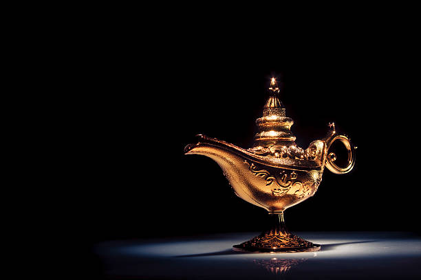 istock Magic Aladdin's Genie lamp on black 462439173