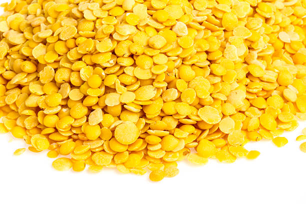istock Yellow lentils isolated on white background. Macro shot 462440167