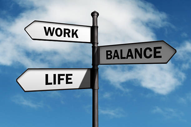 Work life balance choices Work-life balance road sign concept for healthy lifestyle and wellbeing choice life balance stock pictures, royalty-free photos & images