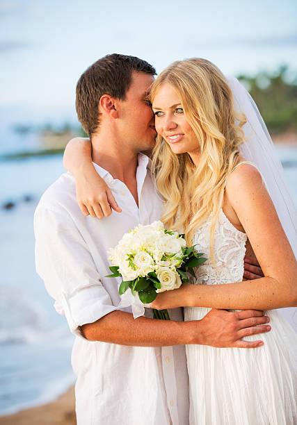 istock Just married couple on beach at sunset 462458667